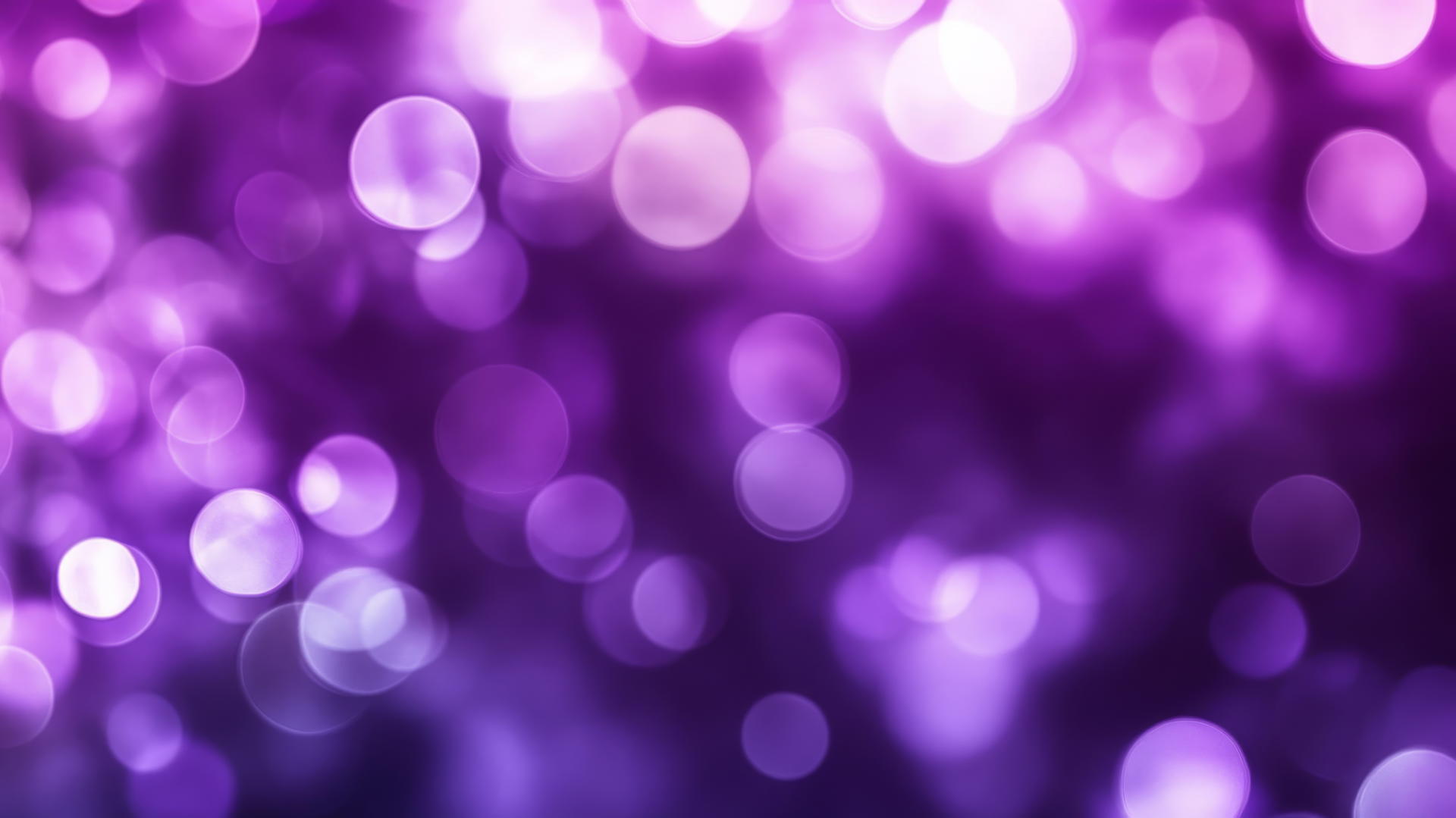 serene purple background wallpaper with smooth bokeh effect and softly blurred circles of light