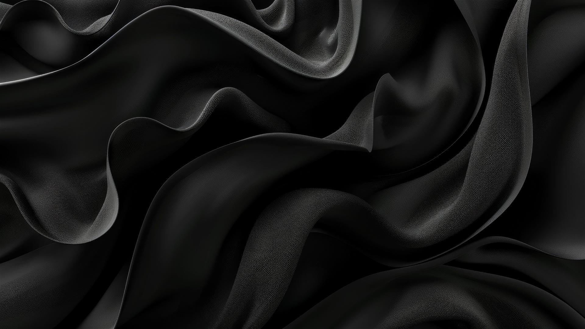 Black graphite tones in a flowing, minimalistic design