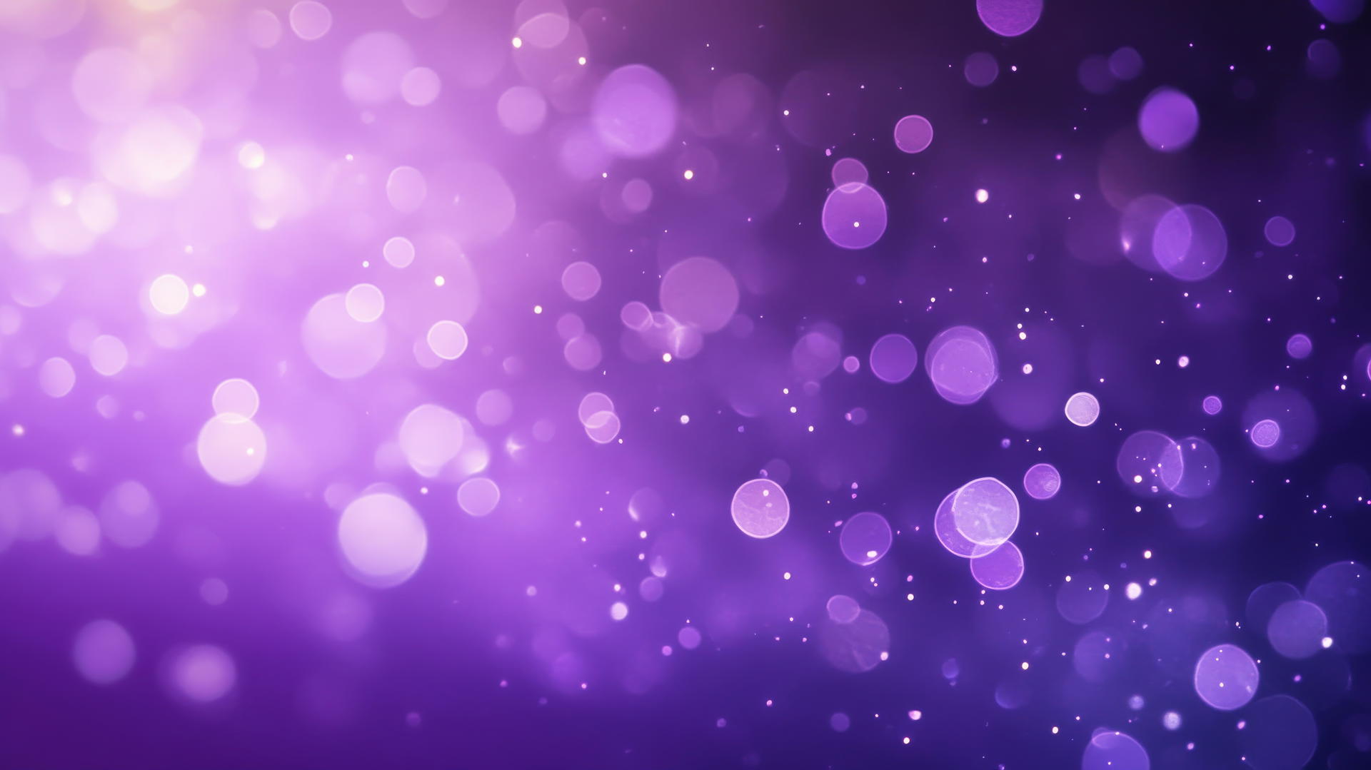 Purple background wallpaper with soft bokeh effect and blurred lavender and violet circles.