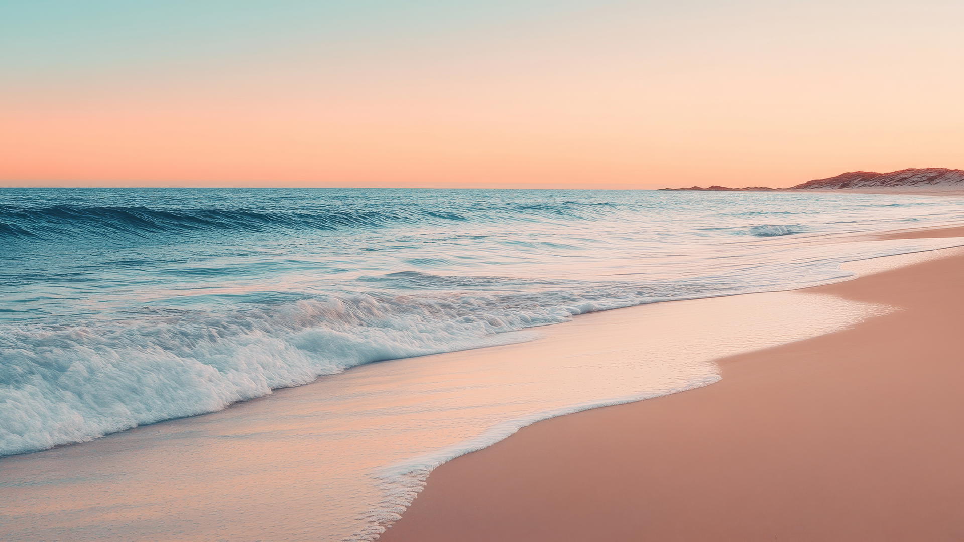Minimalist beach aesthetic wallpaper with smooth sand and gentle waves at sunset.