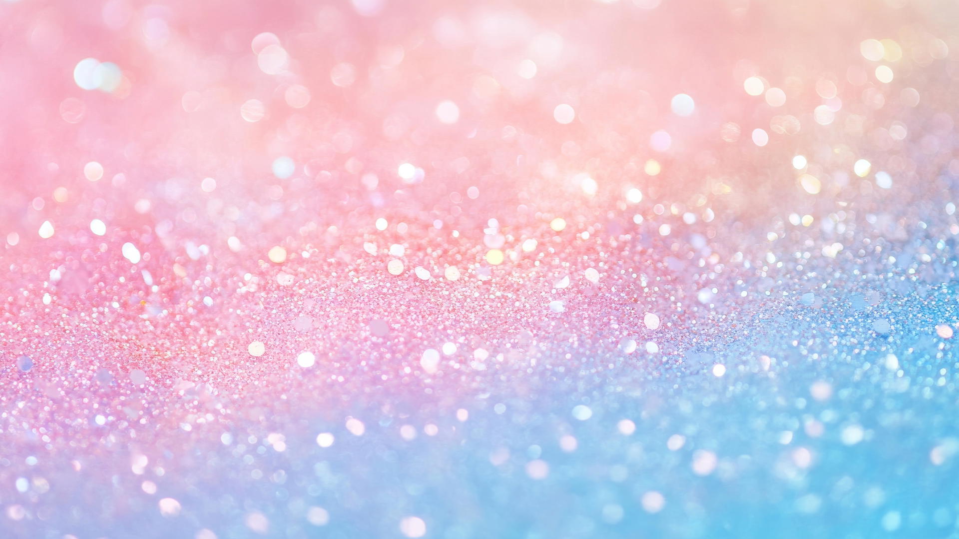Pink and blue wallpaper with a shimmering ombre effect and glittering particles