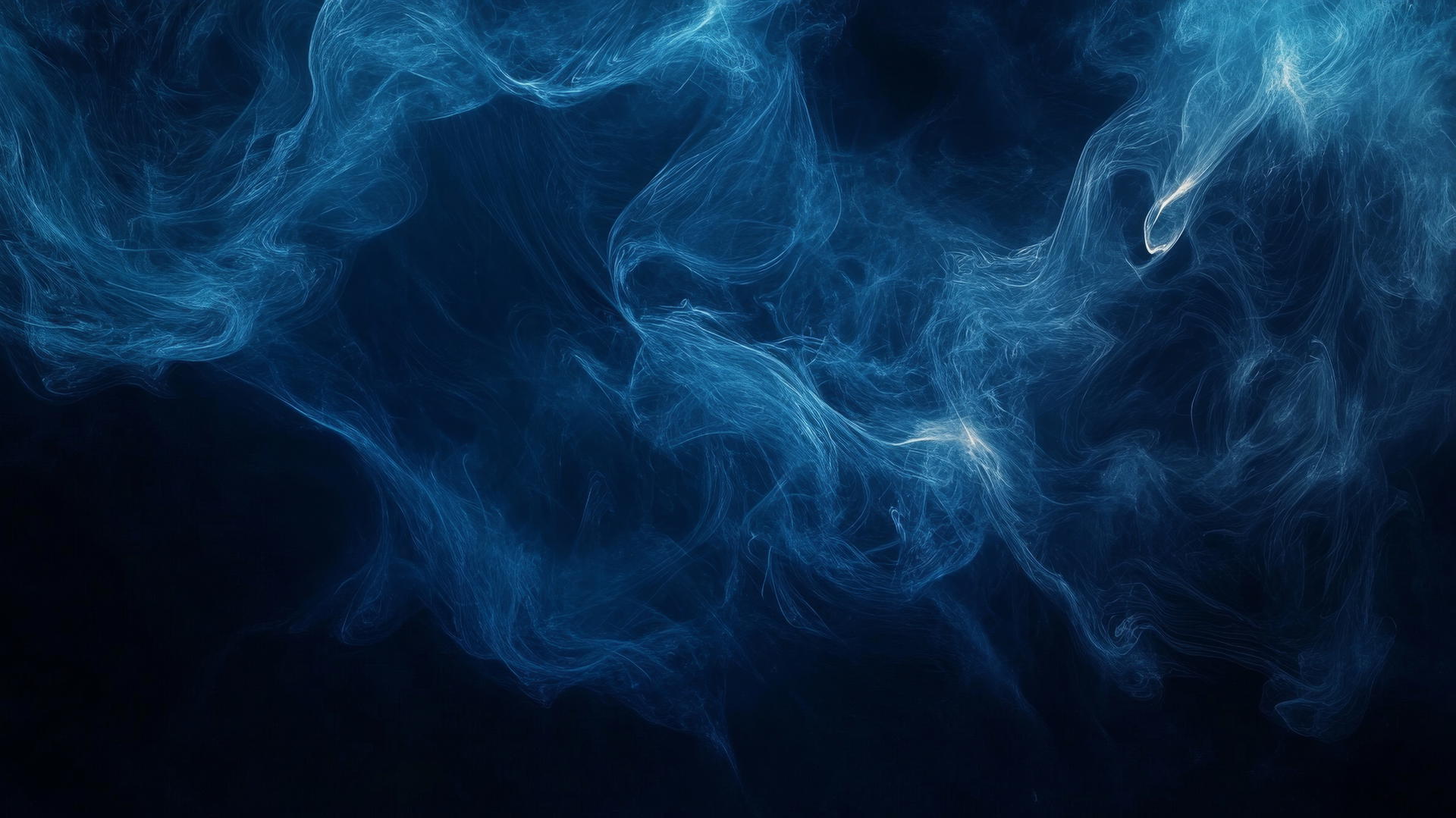 Dark blue wallpaper with abstract smoke swirls on a black background