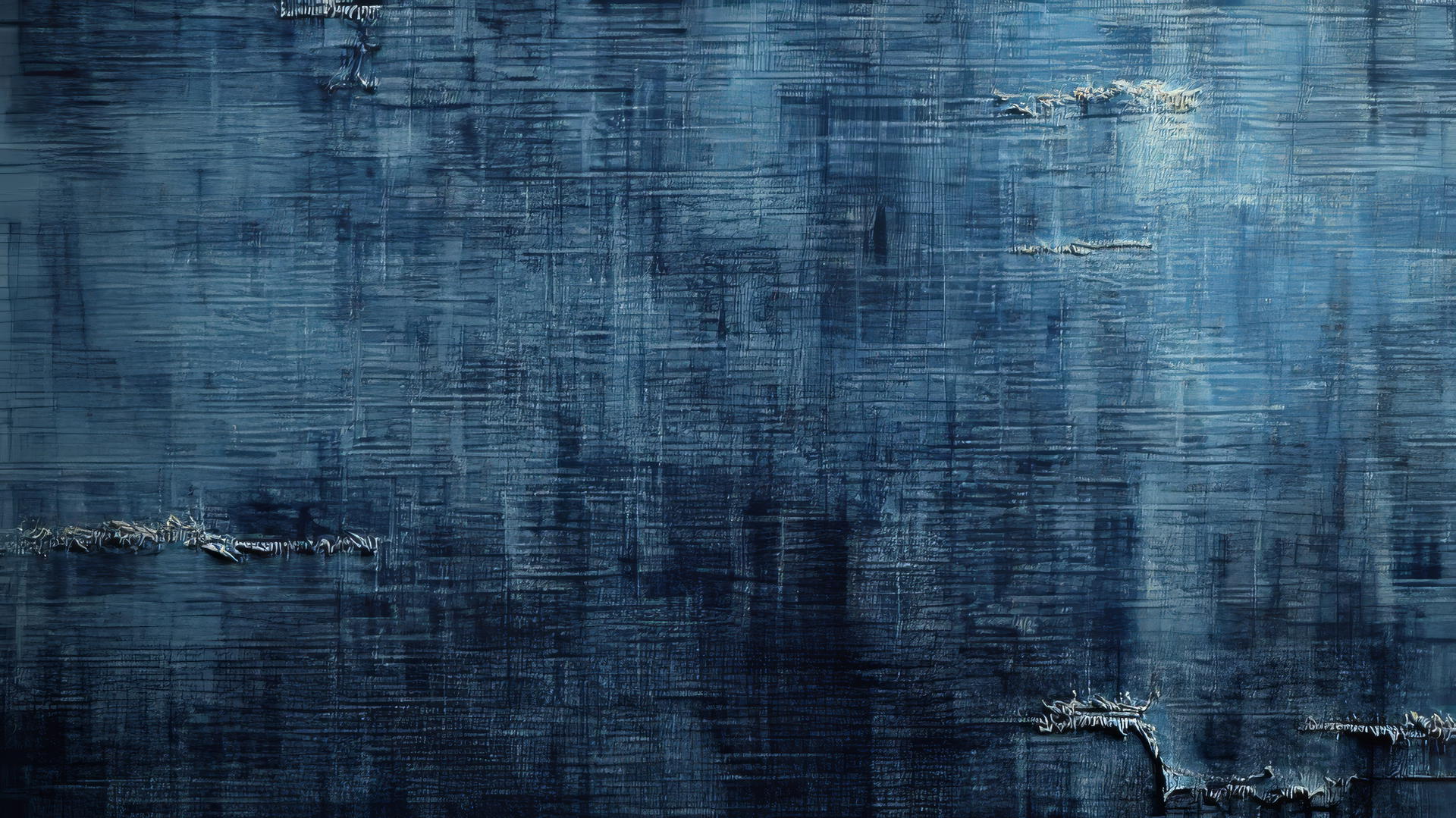 A blue wallpaper aesthetic featuring vintage denim texture with creases and stitches.