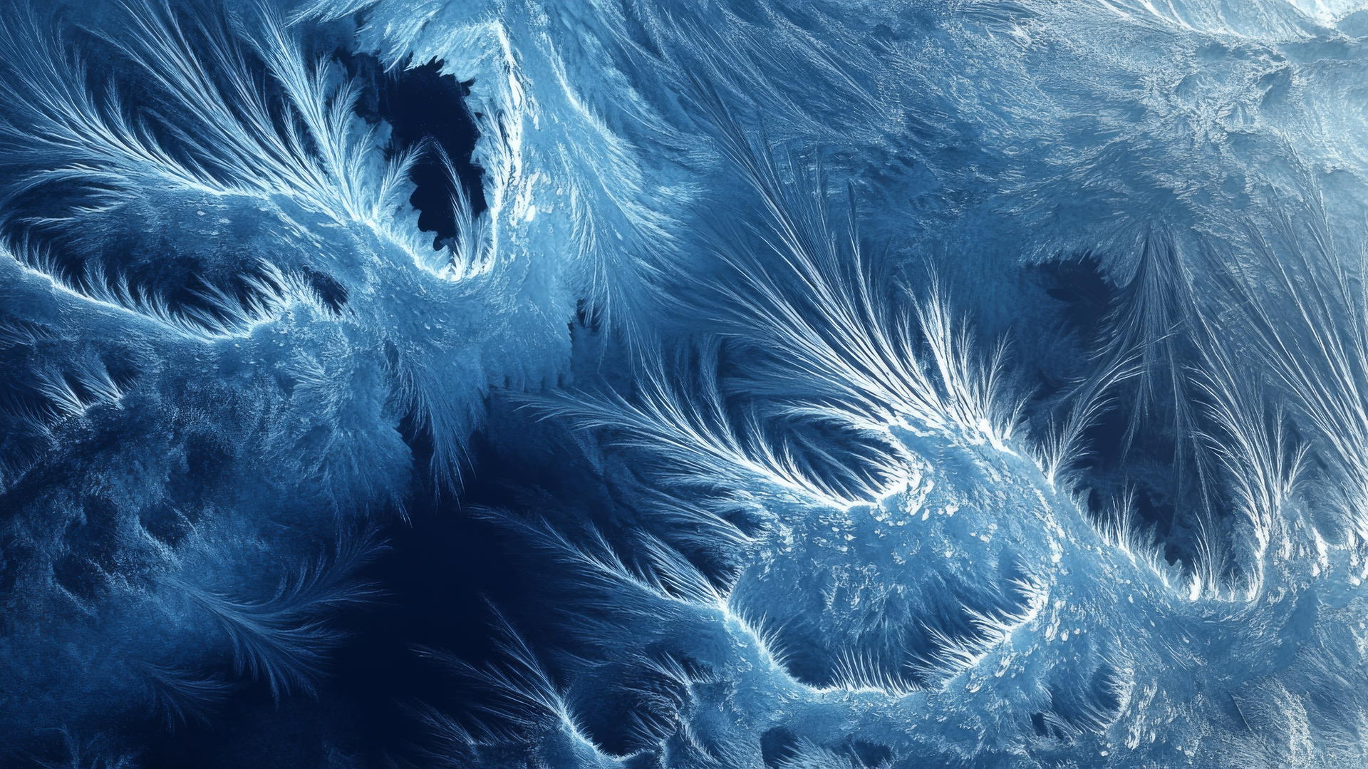 wallpaper blue with fractal patterns resembling blue ice and crystalline structures